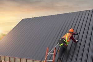 Homeowner records roof damage from the ground while photographing fallen shingles and an interior ceiling stain.